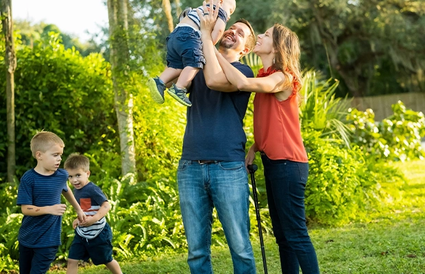 couple holding their child