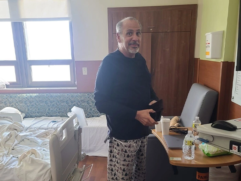 man in hospital room