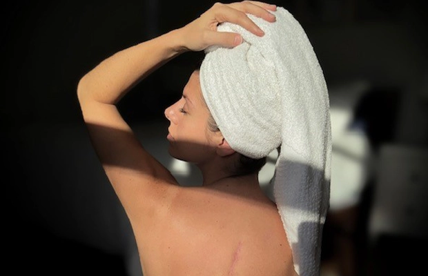 woman with her back freshly bathed
