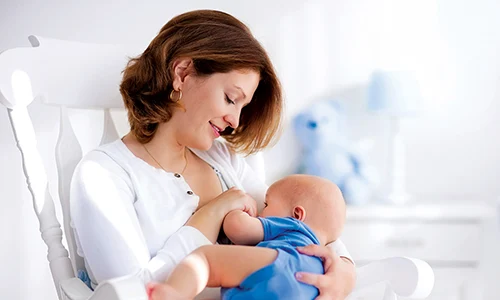 Closeup of a mother breastfeeding her baby