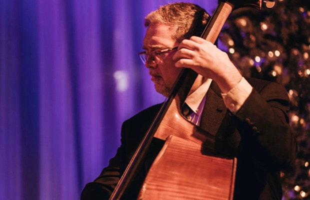 man playing a musical instrument