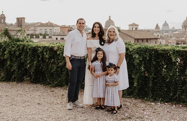 family photo with beautiful landscape behind