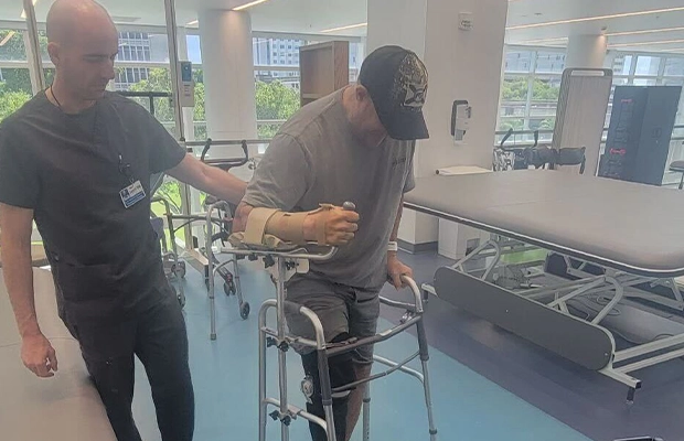 man doing therapy with his nurse