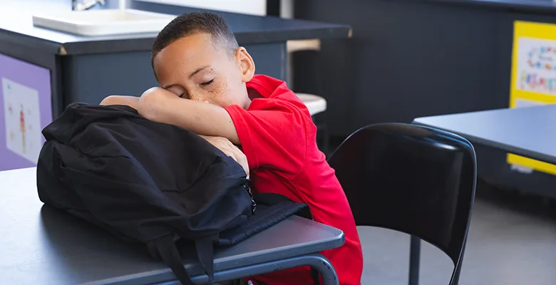 A child sleeping in class