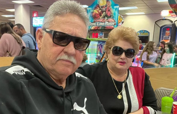 Adult couple posing to the camera