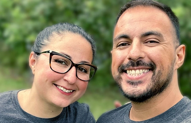 Siblings smiling to the camera