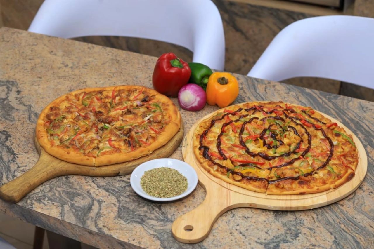 PIZZA CORNER menu category at Cafe Jaf'n, Kampala
