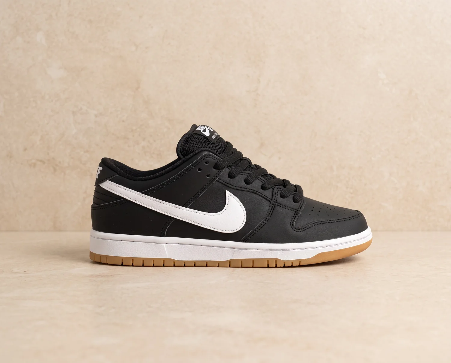 Nike SB Dunk Negra - Blanca