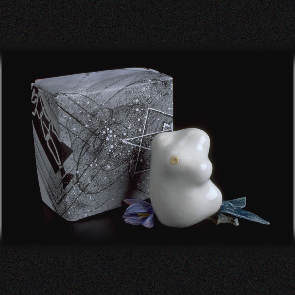assemblage: porcelain lady, origami box, porcelain passion flower leaves