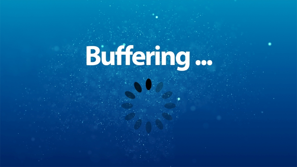 The word "Buffering …" with a loading spinner over a blue particle background