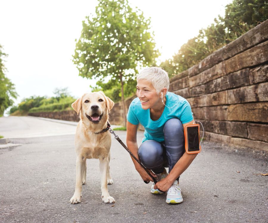 woman running with dog