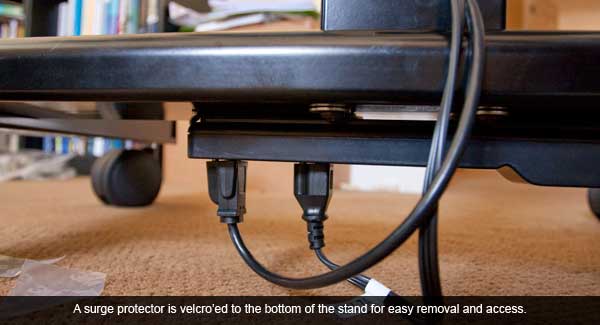 Simple power hack using velcro to attach surge protector to underneath cart.