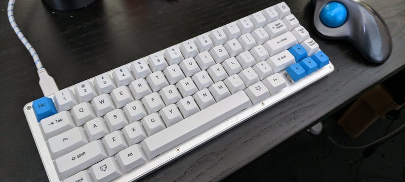 My WhiteFox keyboard sitting on my desk in all it's foxness.