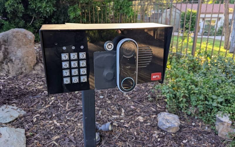 The BFT gate controller hacked with a Google Nest Doorbell and some black gaffer tape.