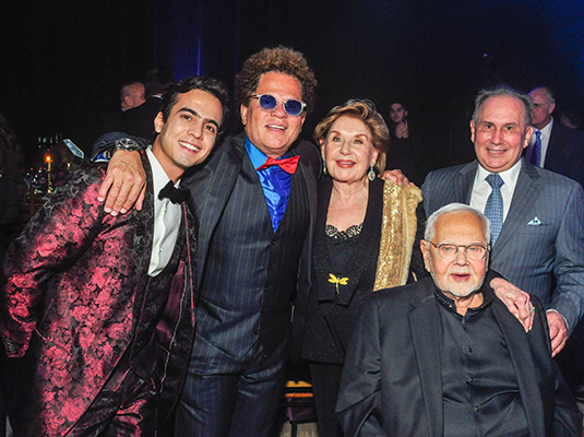 A group of people smiling at the camera