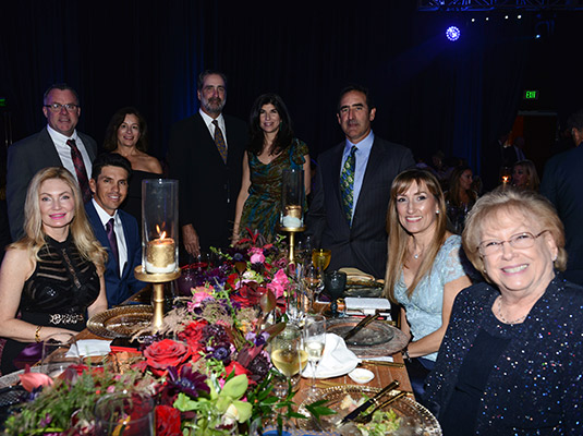 A group of people smiling at the camera
