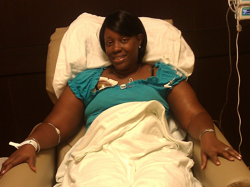 woman lying on hospital gurney