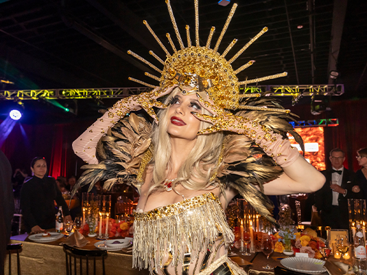 woman dressed in exotic golden attire