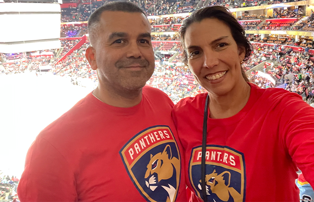 Selfie of a couple in a hockey stadium