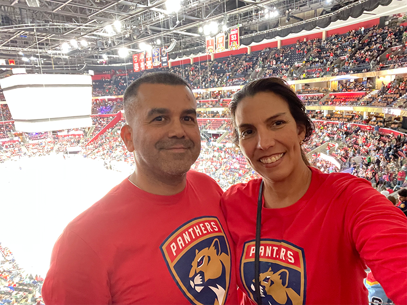 Selfie of a couple in a hockey stadium