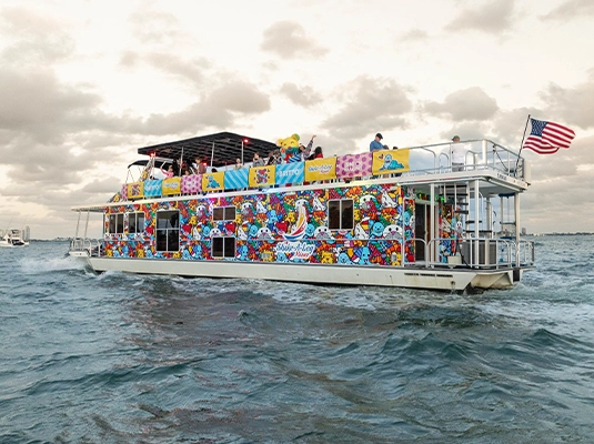 photograph of a colorful boat sailing
