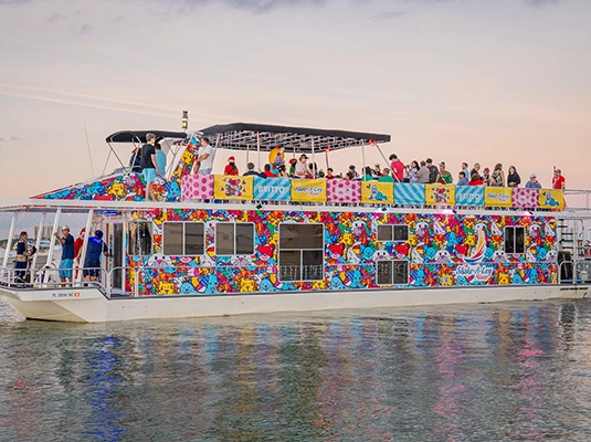 People celebrating on a colorful boat