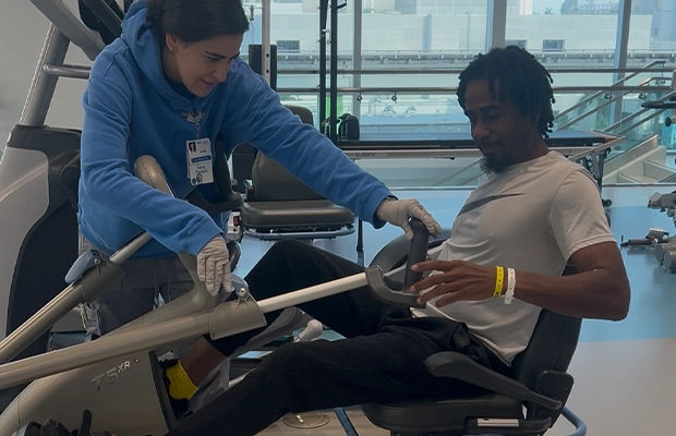 Man undergoing therapy in the company of a nurse