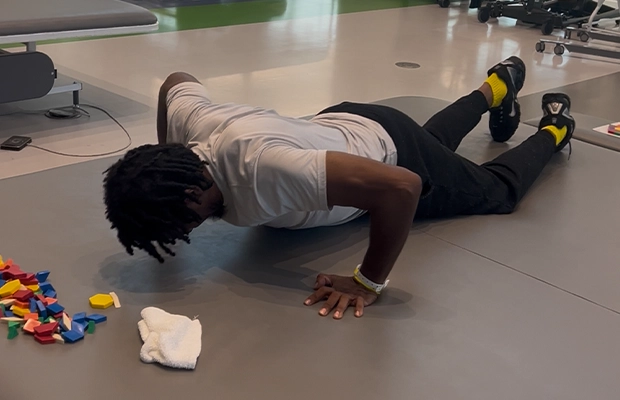 man doing exercises on the floor