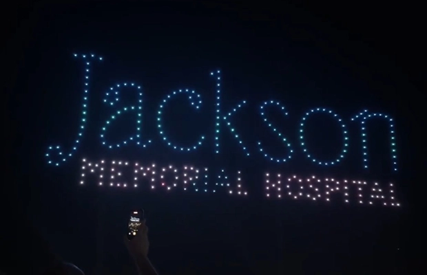 flashes of light in the sky spelling out Jackson Health