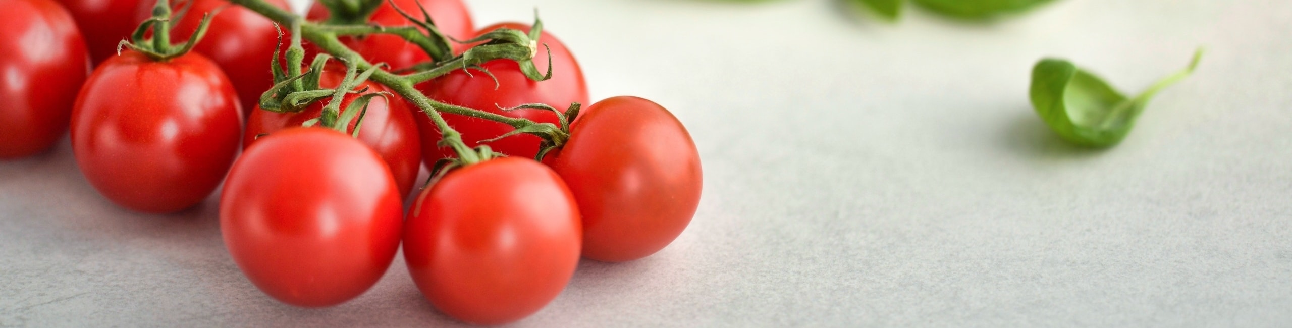 Tomatoes on a table.