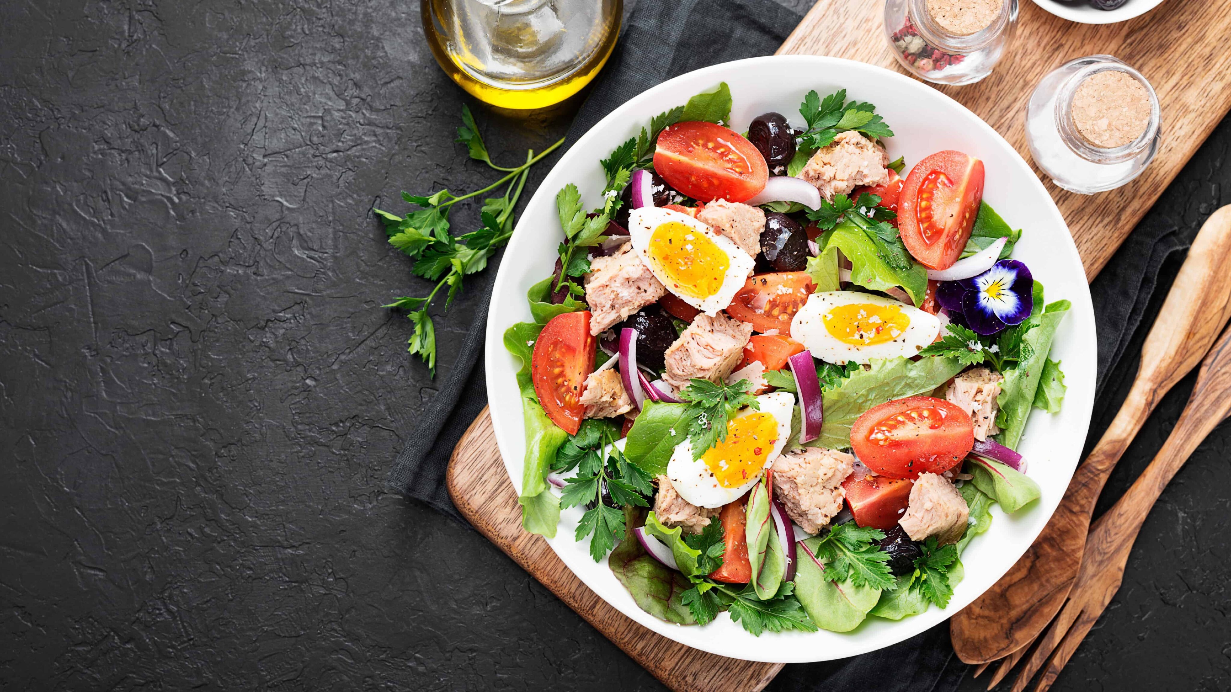 Tuna and egg Mediterranean salad in a plate.