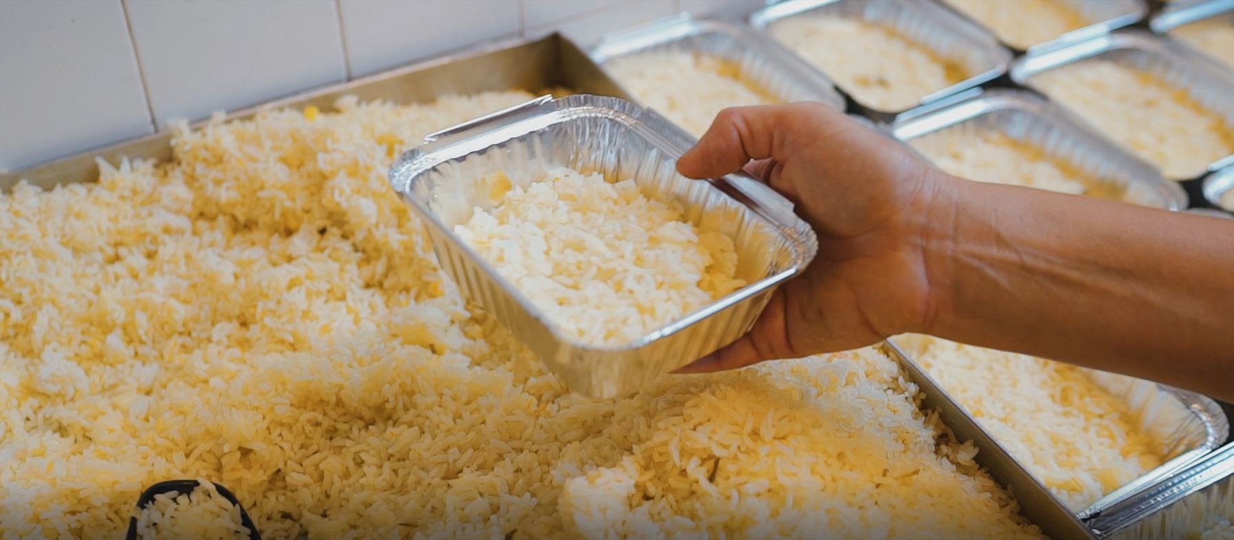 Meal preparation in the kitchen of CASA