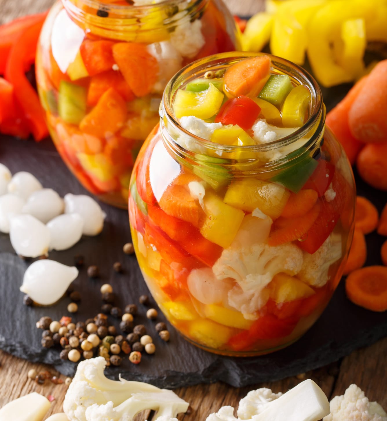 Jar with pickled mixed vegetables.