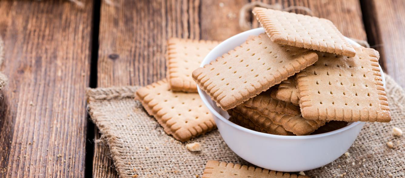 Bowl with biscuits over burlap.