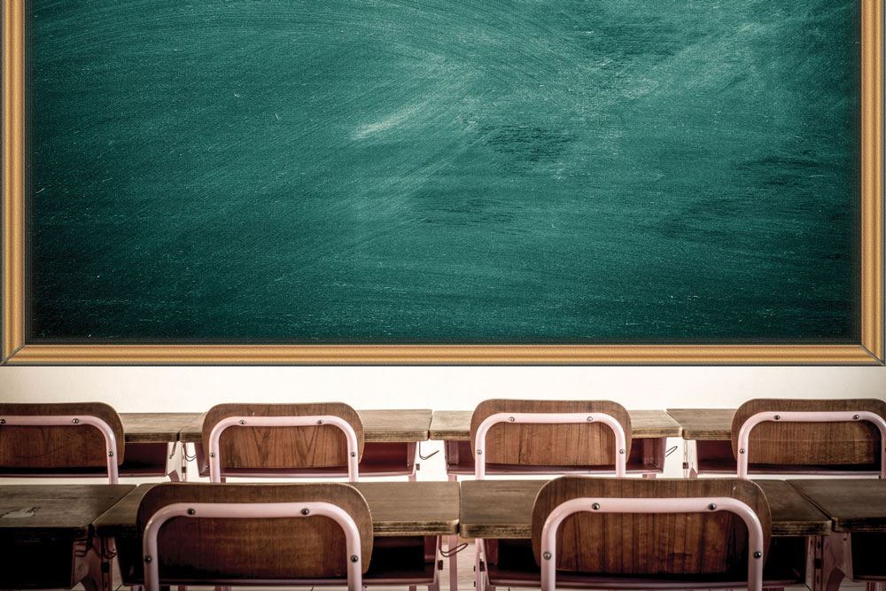 empty school classroom with blackboard