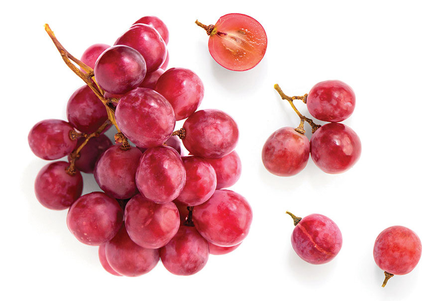 Creative layout made of red grape. Flat lay. Food concept.