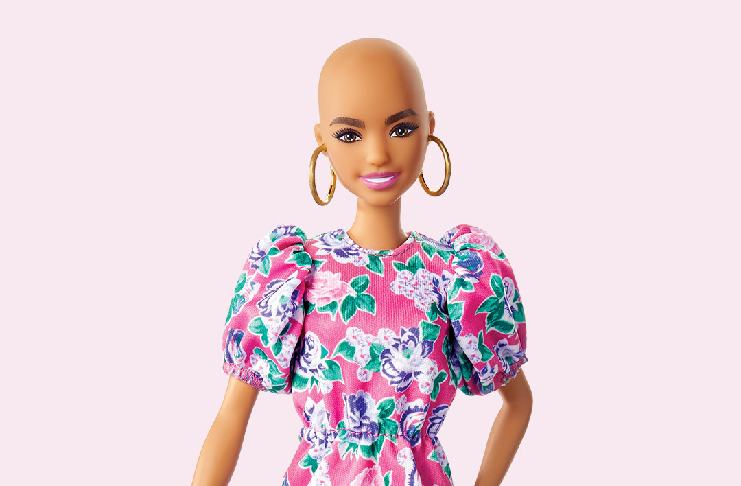 Barbie without hair on pink background