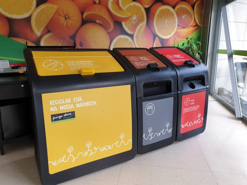 image of three Pingo Doce's recycling bins, inside the store