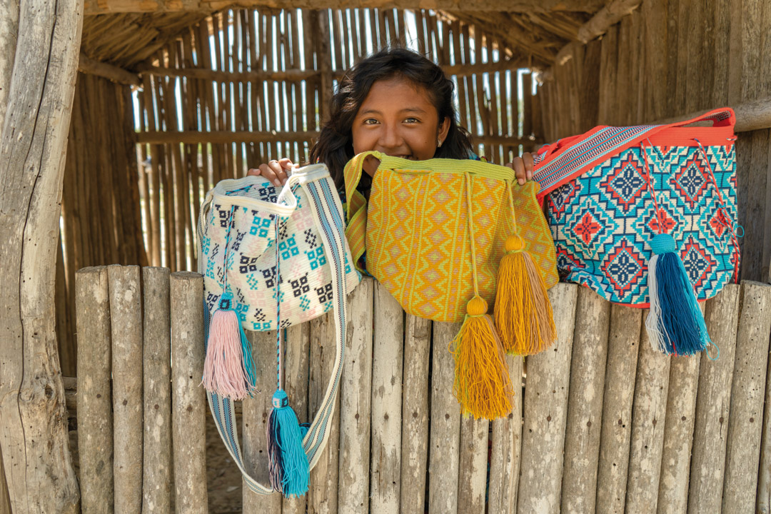 colombian young woman, smiling to the camera