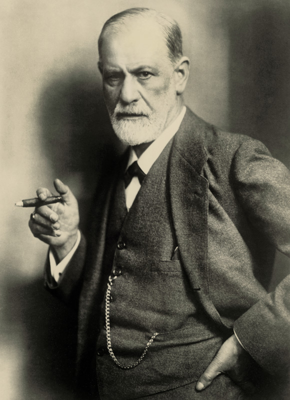 Sigmund Freud  - sepia photo of an old men with serious face and a cigar on his hand