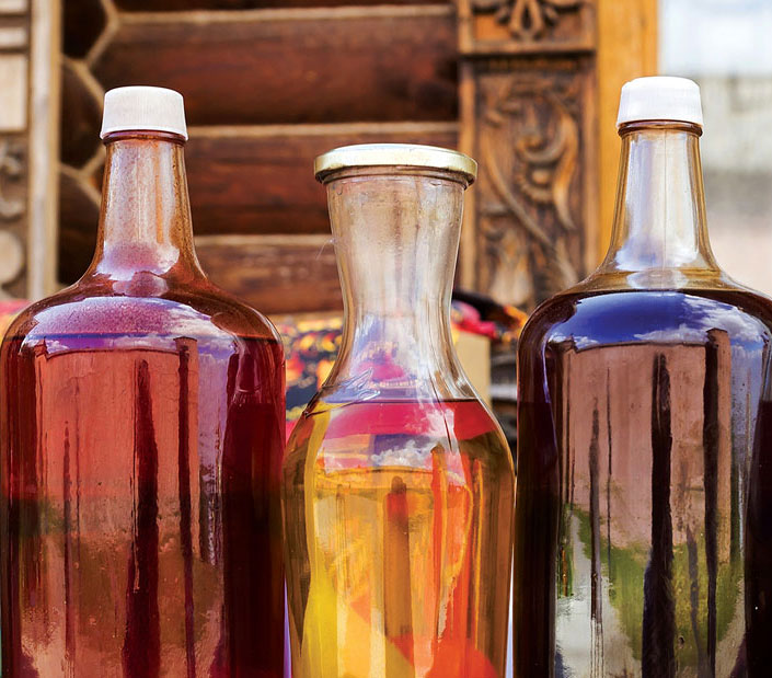 Russian alcoholic drink mead with reflection Kremlin in Suzdal, Russia