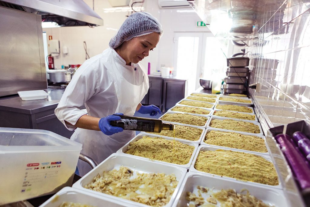 Woman in the kitchen preparing meals