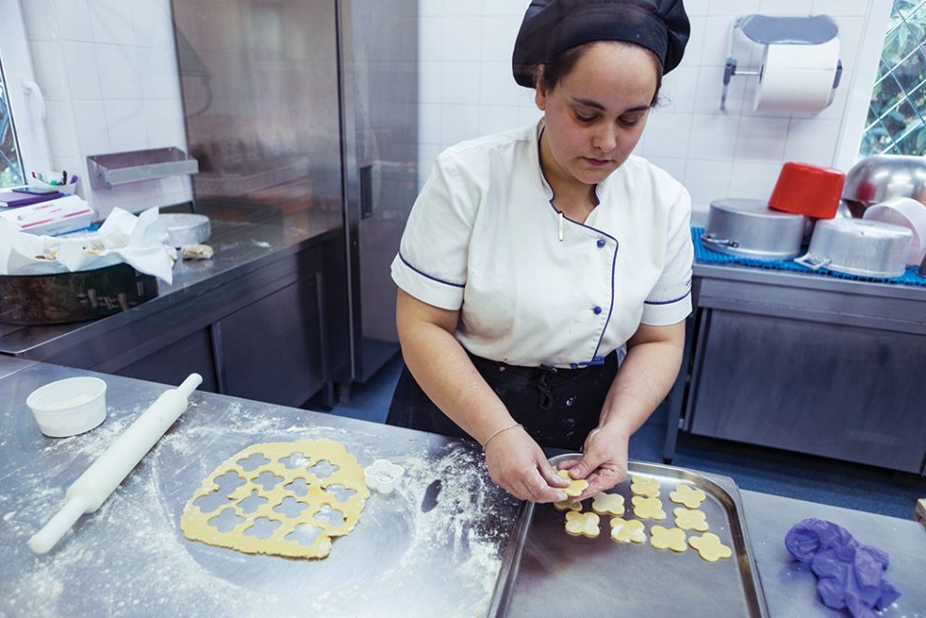 Woman in the kitchen making cookies