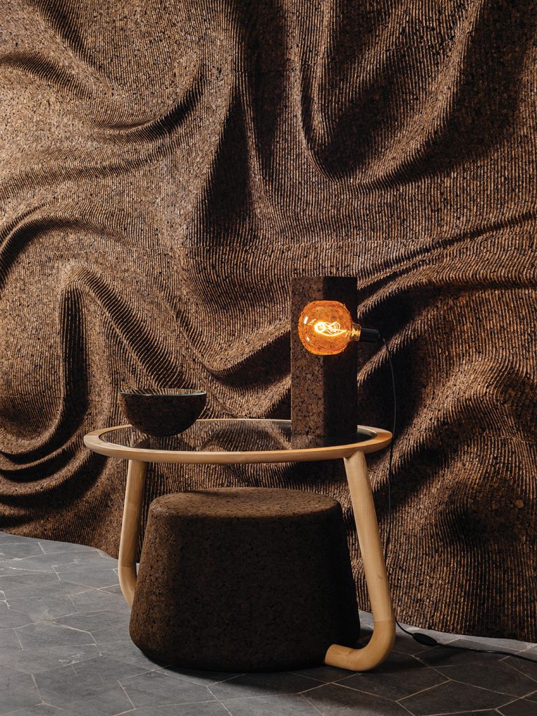 Both the table and the whirl-shaped wall are part of Blackcork and Gencork’s 2019 collection, respectively.