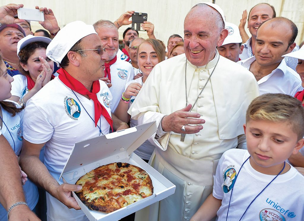 Pope Francis Offers Pizza to 1,500 People Without Resources - Vatican City