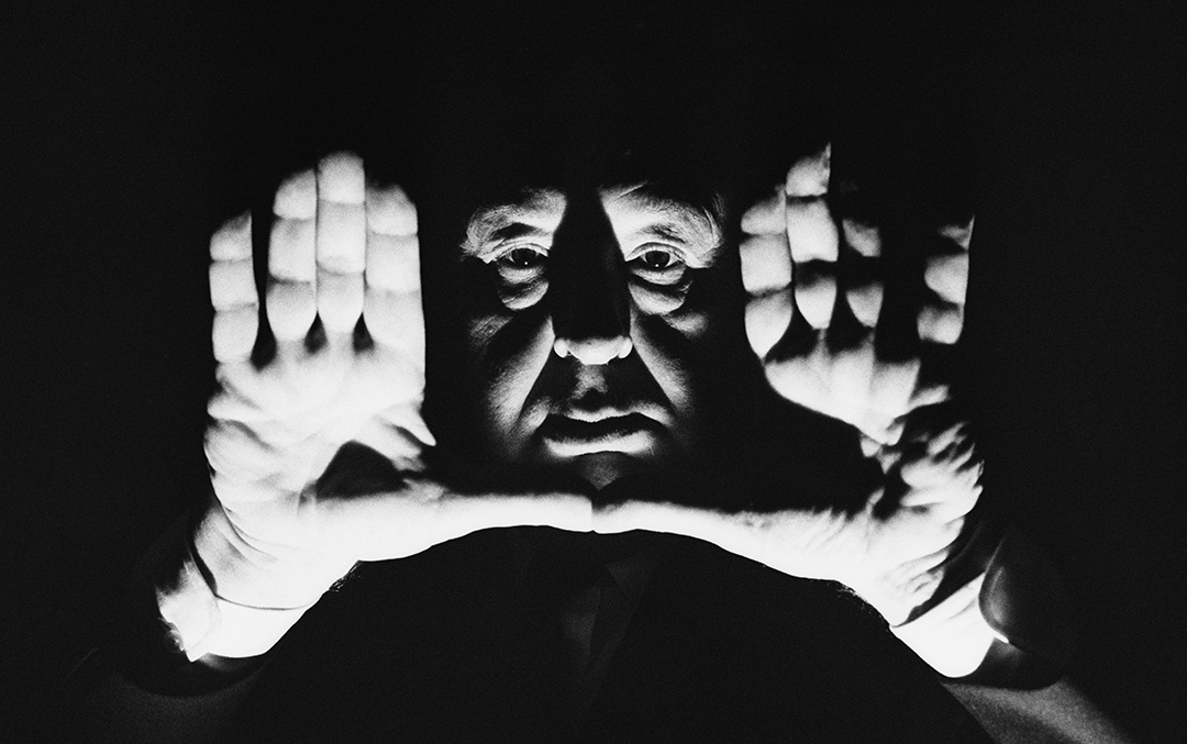 English film director and producer Alfred Hitchcock (1899 - 1980) frames a shot with his hands, 1964.