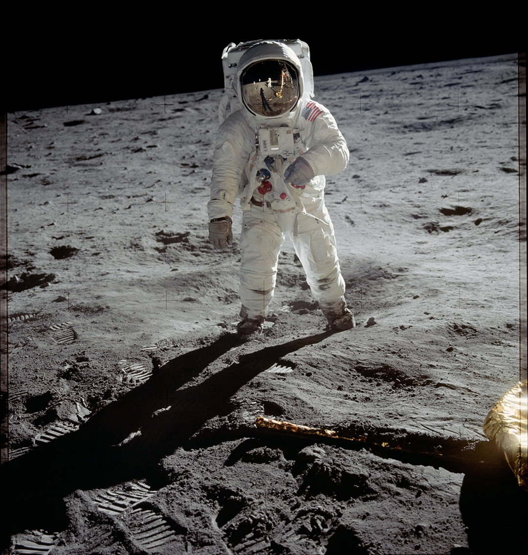 Astronaut Buzz Aldrin walks on the surface of the Moon near the leg of the lunar module Eagle during the Apollo 11 mission. Mission commander Neil Armstrong took this photograph with a 70 mm lunar surface camera, in 1969.