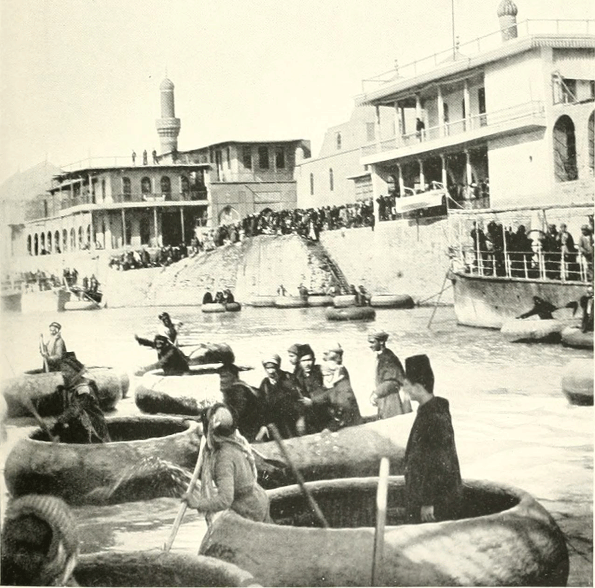 Boats and passengers queue before the Customs House building