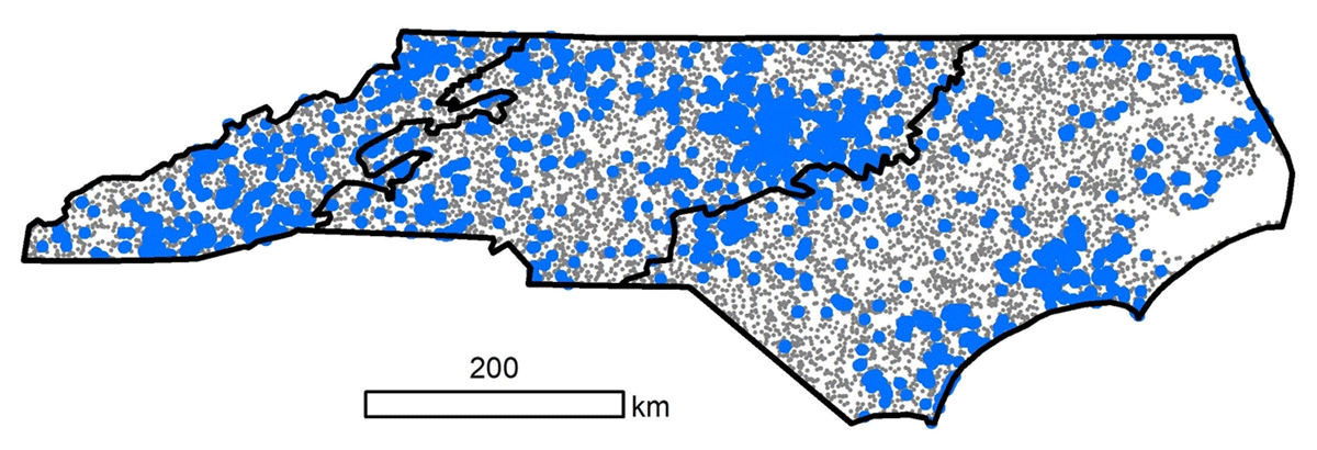 Map of the 9,586 random points (grey) across North Carolina, USA used to quantify variation in available habitat types, and the 4,295 sites sampled with camera traps (blue)