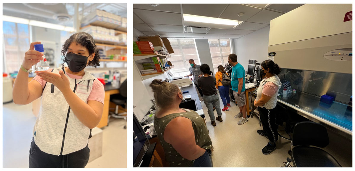 Educators look at microbal culture flask and tour the lab